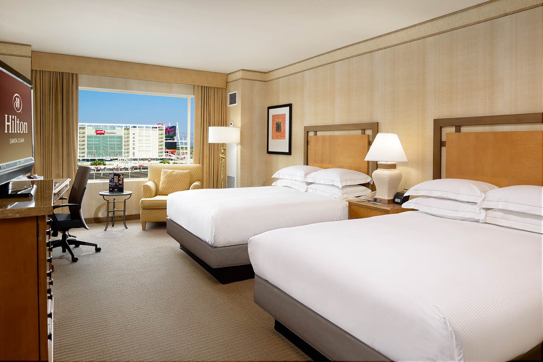 Hilton Santa Clara double guest room with workspace and Levi’s Stadium view